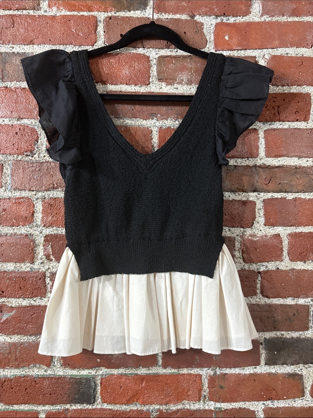 En Saison Black Top with Cream Peplum & Ruffle Sleeves